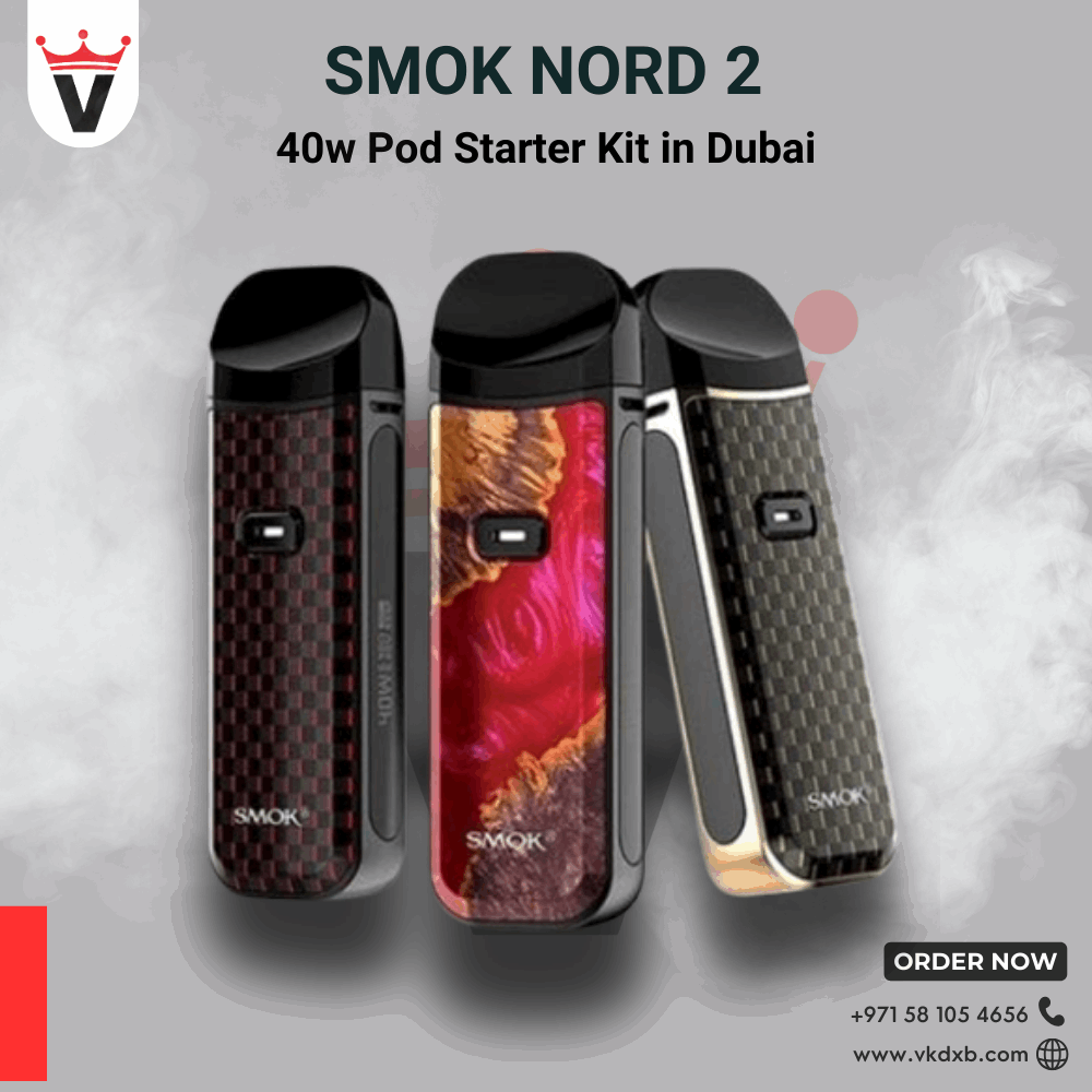 Three Smok Nord 2 40w pod starter kits in red, gold, and black colors with smoke background and Vape King DXB logo.