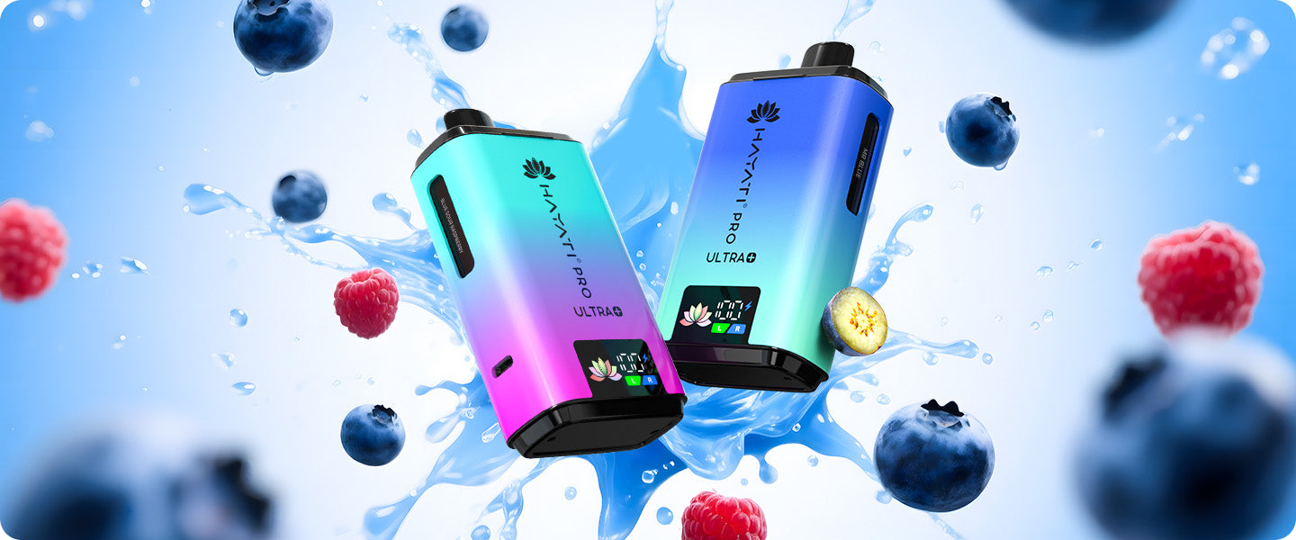 Two colorful electronic devices with blueberries and raspberries in the background